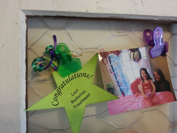 A closer look at a section of the message / picture board here reminds me of when I finished radiation treatment for breast cancer. Also, there is a photo of my granddaughter on her fourth birthday with my daughter.