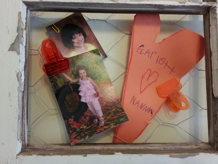 This section contains photos of my two granddaughters and a heart that my oldest granddaughter made for me, her Nanny.