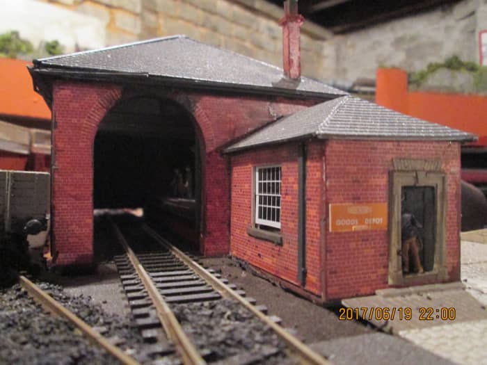 This is where the wagon weighbridge will be added, in front of the large - slightly ajar - window of the office. Balsa was added and painted to improve the appearance of the window sill