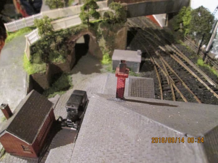 Bird's eye view over goods shed shows cab's on its wayr. Note vegetation and picket fencing added. Still some to add on the ramps, as well as a loading gauge and platform water crane. Soon be complete, then it's hi-ho, hi-ho to add the fiddleyard