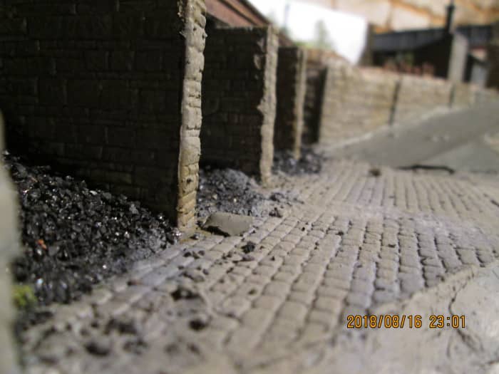 The road surfaces have been painted, as has some of the other scenery. This is the view along the coal cells looking uphill towards the underpass