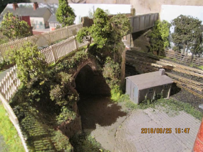 The occupation bridge and goods/coal depot access road with picket fencing instead of NER/LNER company style fencing - ravages of nature and time (as well as post-wartime economies)