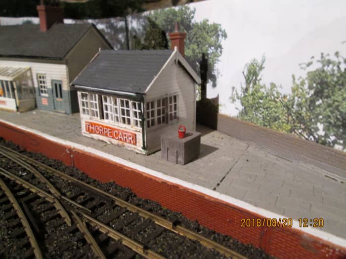 The signal cabin has 'acquired' a coal bin, that someone's left a fire bucket on top of. No sign of a station cat yet.... Water crane to be added at this end of the platform for thirsty engines (don't want Thomas to go dry now, do we lads'n'lasses?)