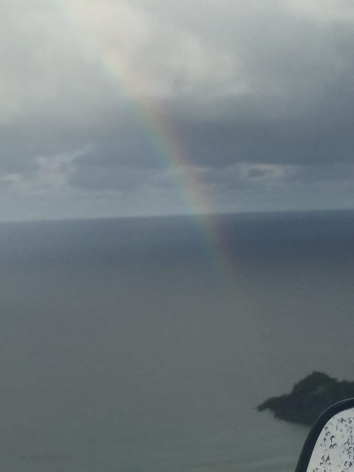 Captured this magnificent rainbow on December 3, 2017 @ 7:52am, westward side of St. Thomas, Puerto Rico is far in the background. Ocean bow!