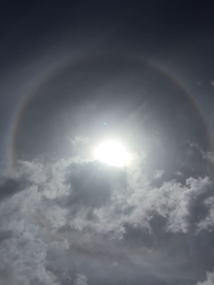 September 29, 2017 @ 11:54am. This rainbow was captured when I was tossing a salad for lunch and my kids was calling out Mom a rainbow! I came out with my camera and snap snap what a Fantastic view, check out the video.