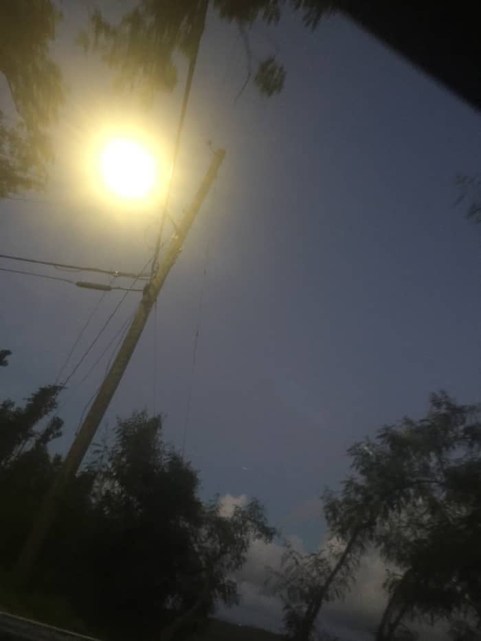 On November 25, 2017, captured a sunbow of the color yellow, orange and a light red @5:57pm. Arrived home at the driveway, when I spotted the rainbow.