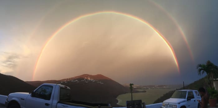 This caption was taken 8 days after a category 5 hurricane that hit the United States Virgin Islands St. Thomas. Hurricane Irma that was known to be the strongest wind speed at 260mph. Then phenomenally a rainbow appeared. Snap rrrrr.ðŸ˜Â