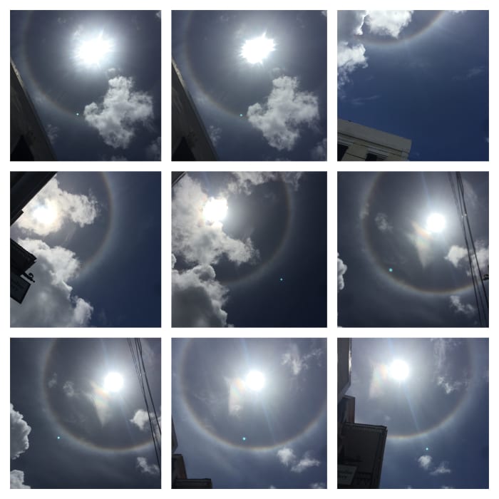 May 3, 2018 Thursday Captured sunbow @11:01am, I was at work, went on a break, look up to get some sun and yeay a SunBow. Fantastic St. Thomas USVI looking up from Main Street.