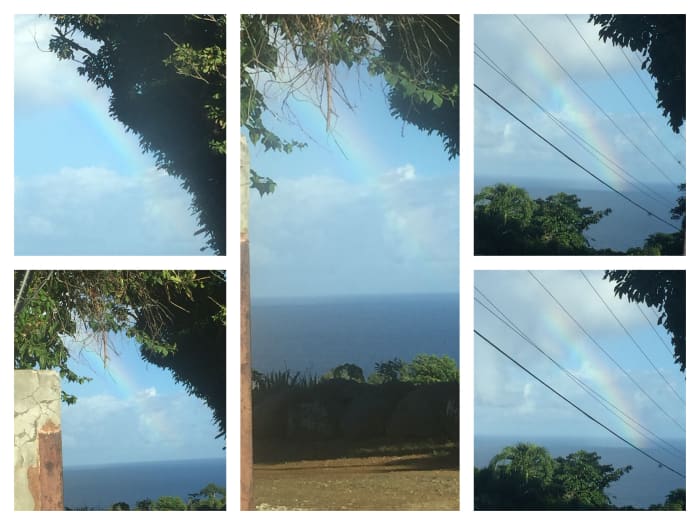 Wow, October 22, 2018 @ 7:38am West side between the islands of St. Thomas and Puerto Rico. I got a glimpse between a road pathway. Check out the blues in this rainbow.