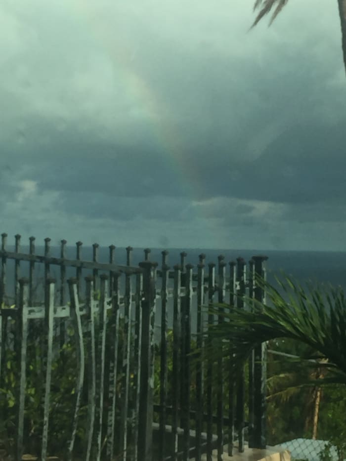 December 3, 2017 @ 7:08am Westward side of St. Thomas, this rainbow was a double, one appeared two minutes after this one rainbow appeared. Double impact by a flash of minutes in color motion. It was phenomenal.