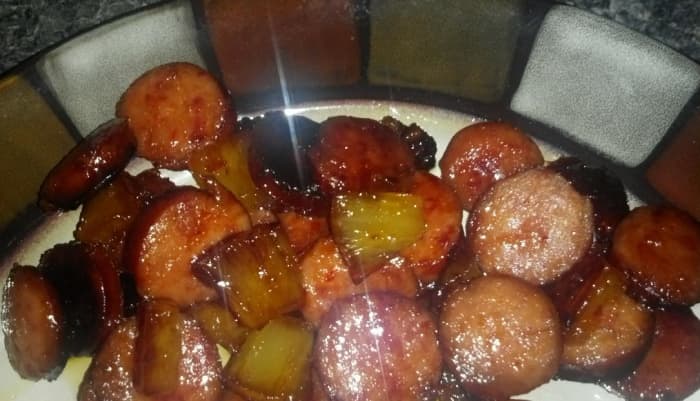 The caramelizing of the brown sugar and pineapple heavy syrup have made the dish so shiny it is reflecting the camera flash. It has a sweet and salty taste that we all love!