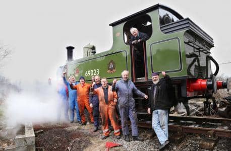 Members of the North Eastern Locomotive Preservation Group (NELPG) rest beside J72 69023 'Joem' for a group shot - loco was among last batch built to Wilson Worsdell's drawings of the 1890s - currently undergoing work at Hopetown