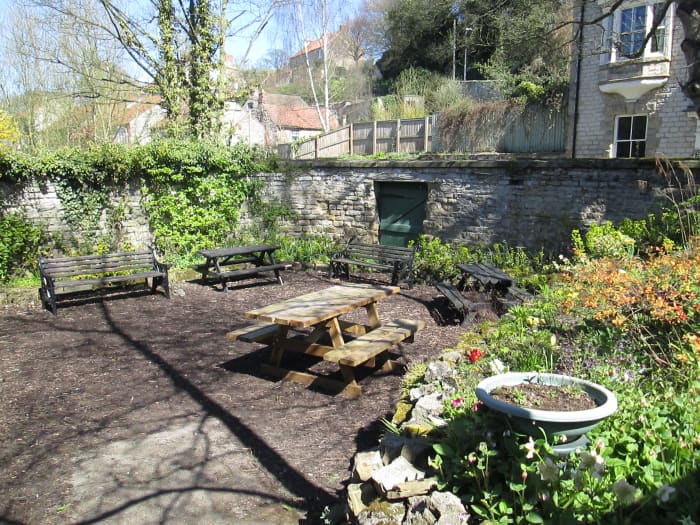 Behind the 'up' platform you'll find this peaceful little garden with benches to get away from it all - located near the porter's hut above