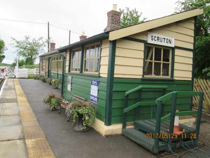 A look along the platform, west-to-east, shows the old platform signal cabin in line with the station building (SM's office, booking office, waiting rooms)