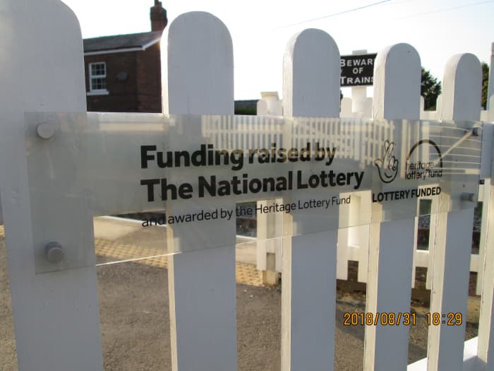 Thanks go in part to the Heritage Lottery Fund, as displayed on the wicker gate at the crossing (above)