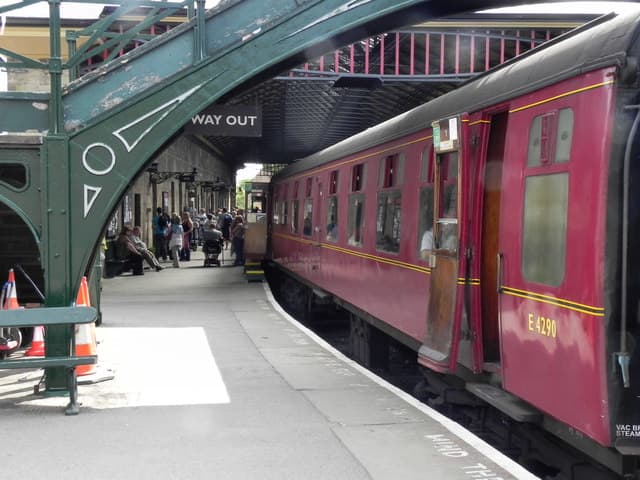 Pickering Station - a rake of British Railways' Eastern Region C1 carriages in post-1956 maroon livery awaits its locomotive for the next return working north to Grosmont or Whitby