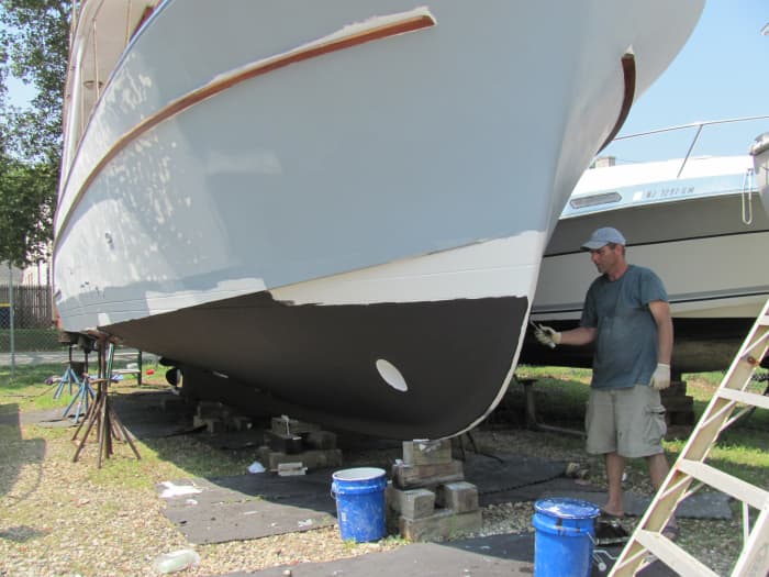 Ablative anti-fouling paint prevents barnacles from attaching to the bottom. Each coat dries quickly, so several coats can be done in a single day.