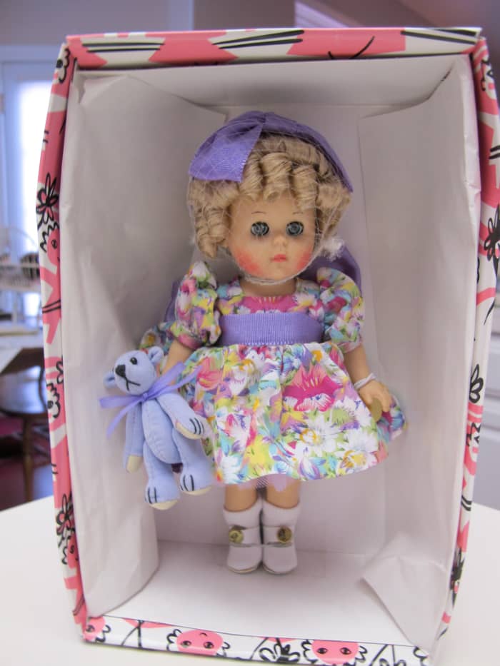 Dolls kept in their original boxes increase in future value. This version of the Ginny Doll, complete with a matching teddy bear, is called "Flower Time."