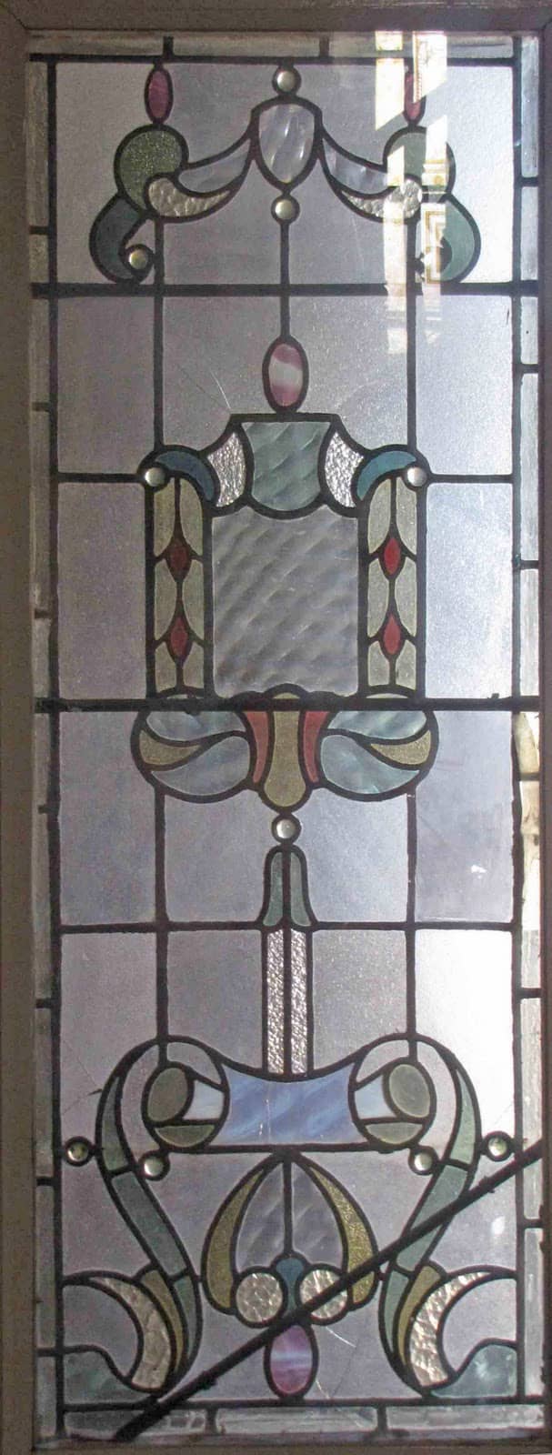 Slight color adds even more charm to this antique leaded glass window