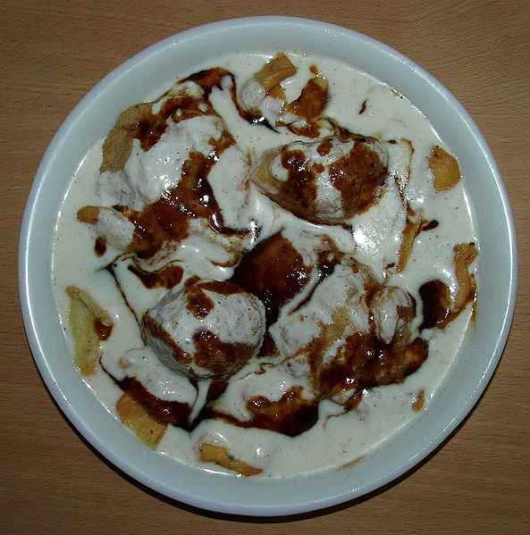 This salad contained crisp lenthil crackers soaked in curd or yogurt swirled with tamarind chutney and boiled potatoes