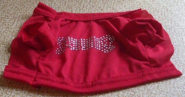 I had to cut the red doggie shirt entirely down the front center to adjust for the kitten's body groing and getting bigger all around.