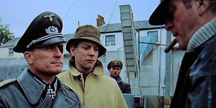 Colonel Radl, accompanied by Liam Devlin (Donald Sutherland), puts forward his proposition to Steiner on the occupied Channel Island of Alderney