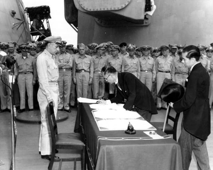 Japanese Foreign Minister Mamoru Shigemitsu makes Japan's unconditional surrender official on board the USS Missouri on the 2nd September 1945.