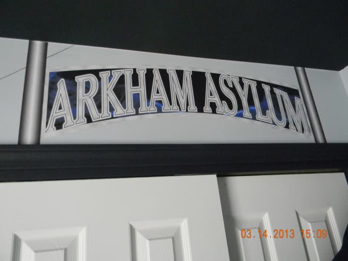 This is the Arkham Asylum sign that is attached over the closet. It was printed on indoor polypropylene and attached with DIF wallcovering adhesive. Here is where Batman places all the villians...and clothing...and toys.