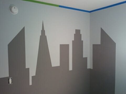 This shows the Gotham City skyline after the FrogTape was removed, but before detail lines were applied with a black Sharpie.