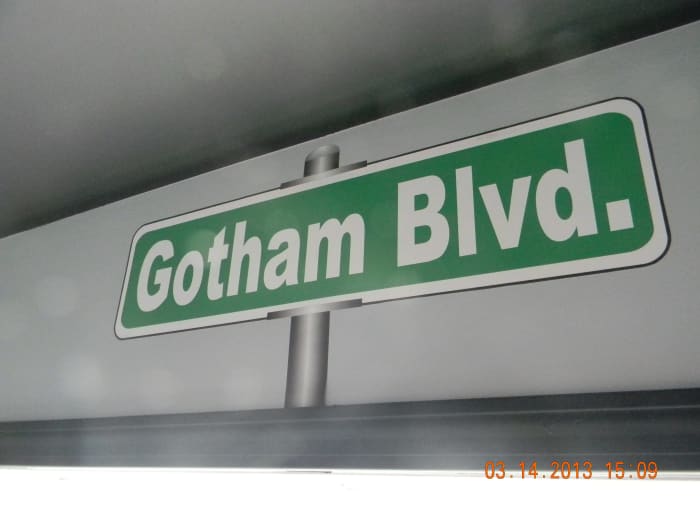 Here is the Gotham Blvd sign above the window announcing that you are in Batman's home city of Gotham.