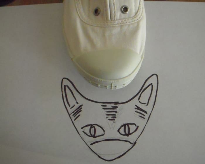 Draw your design on paper first. I drew over my pencil design with pen so that it would be more visible for photo purposes.