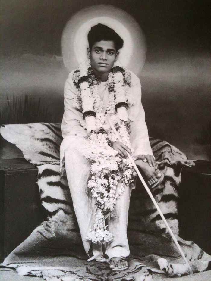 Baba in the early 1944. The photo has been taken in a studio in Bangalore when Swami acceded to the request of a devotee.