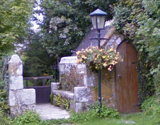 Holy Wells Near Newquay: Colan Holy Well is across the road from this gate; the store at the gate was to provide bread and ale to travellers.