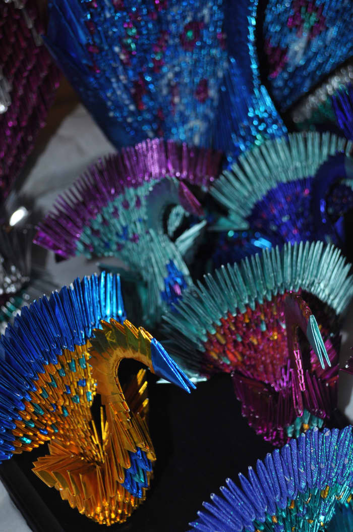 For the wedding I made 3d origami peacocks for every table...but that story of craziness & 10,000 pieces of paper is for another day! :)