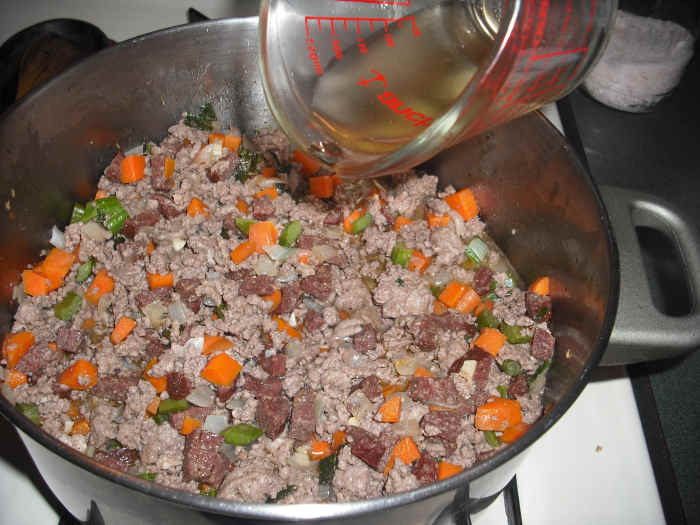 Add the white grape juice and cook, stirring occasionally, until all of the juice has evaporated. This can take a little while, but don't worry, your patience will be rewarded!