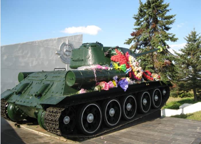 Soviet Tank at World War II Memorial in Field Outside Veliky Novgorod, Russia, Veliky Novgorod is south of St. Petersburg and was captured by Germans who destroyed much of the city.