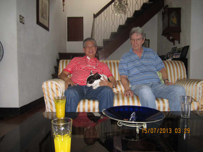 Billy Badilla and Ed. The photo was taken at the home of Billy's sister, Bessie Badilla. Billy is a co- partner of the Badilla Aviary along with his brother.