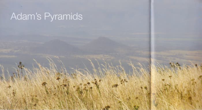 Adam's Pyramids as seen from the calender iste on the edge of the escarpment. They are about seven miles away from Baberton impact crator, which is about 3 billion years old and is the home of the oldest rock formations on Earth.
