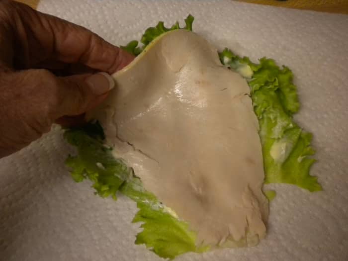 3) Add a nice big piece of deli luncheon meat. My favorite for this is oven baked turkey breast because it doesn't break apart like chicken does.