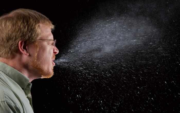 A sneeze captured with a high-speed camera shows just how much and how far contagion can spread if the sneeze is not covered up
