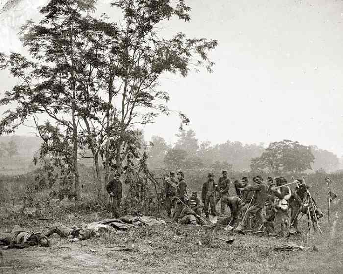 A burial detail at the Antietam battlefield poses for a photograph before it inters deceased comrades