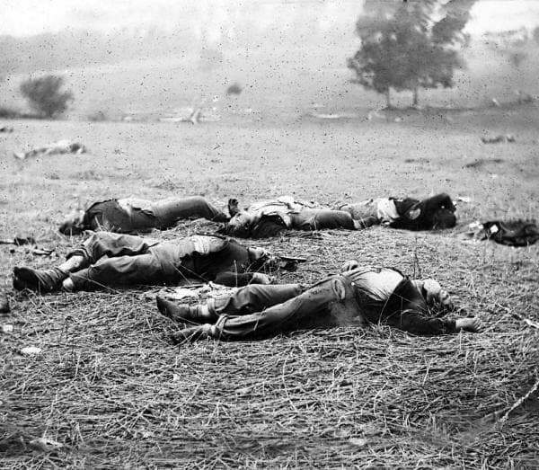 Union dead at Gettysburg, PA. By the time of this photograph, these corpses were on the field for about three days. Note the blackened skin and bloated conditions of the abdomen, limbs, and faces