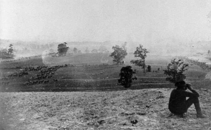 A courier, behind Antietam Creek, scans the battlefield as an artillery battery remains limbered and ready to move
