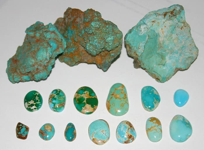 Untreated turquoise, Nevada USA. Rough nuggets from the McGinness Mine, Austin, Nevada; Blue and green cabochons showing spiderweb, Bunker Hill Mine, Royston