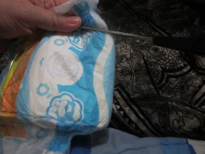 Second, DON'T cut where there is thickness. slice a small hole to the side, The dog's tail will be sideways but I guarantee you, no leaks or fallen turds.