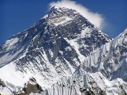 Mt. Everest, the highest mountain on Earth - is situated along the Nepalese-Chinese (Tibet) border and administered by Nepal.