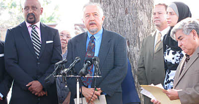 At the podium (center), Randall Kallinen is a Civil Rights Attorney in Houston Texas and has for years fought against laws that make the lives of homeless people even harder than they already are. He currently represents James Kelley pro bono