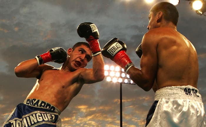 Boxing technique works well in MMA as long as you combine it with other striking, kicking and grappling skills.
