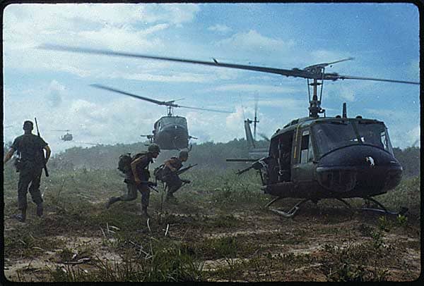 UH-1D helicopters airlift members of the 2nd Battalion, 14th Infantry Regiment from the Filhol Rubber Plantation area to a new staging area, during Operation "Wahiawa," a search and destroy mission conducted by the 25th Infantry Division