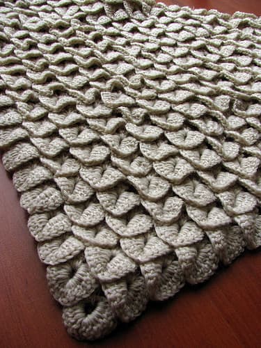 For the love of crocodiles. Here you can see what a larger project layered with crocodile scales looks like. Here they are all crocheted in one solid color.